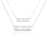 Grande Silver 'RESIST' Nameplate
